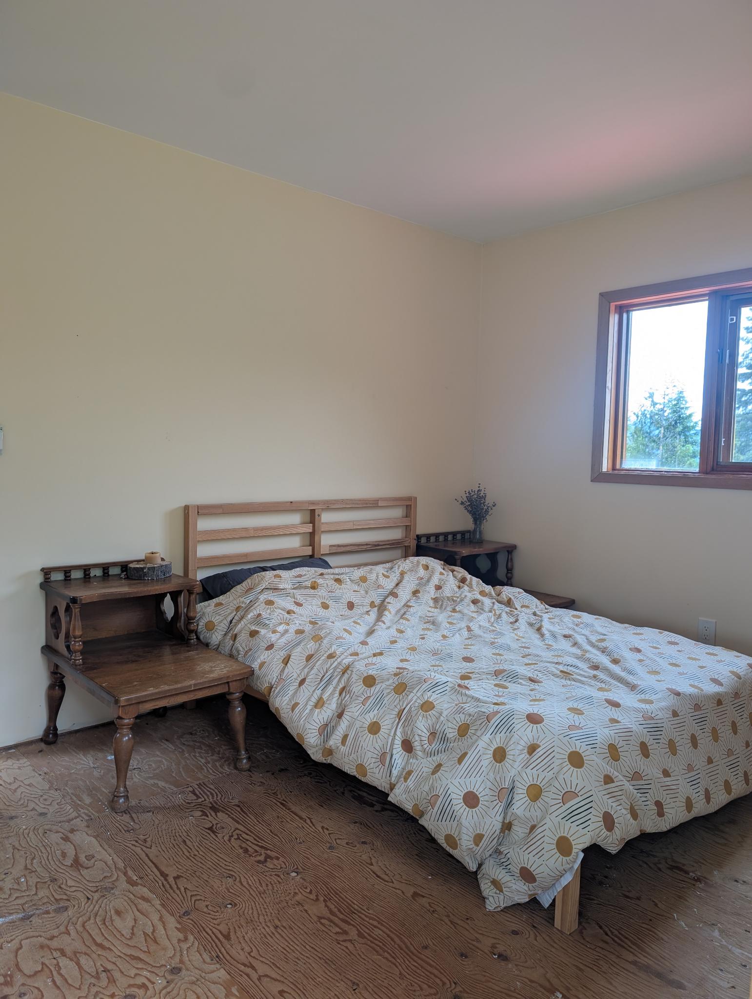 Bedroom with sun-pattern bedding