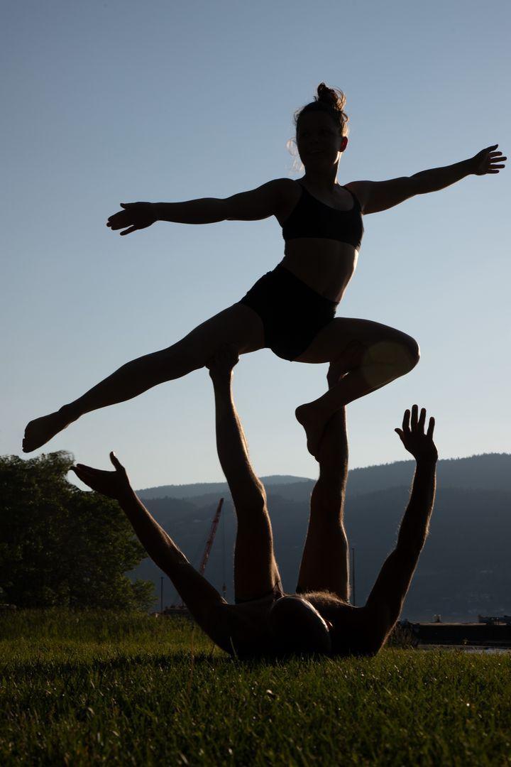 Sunset acro at the lake
