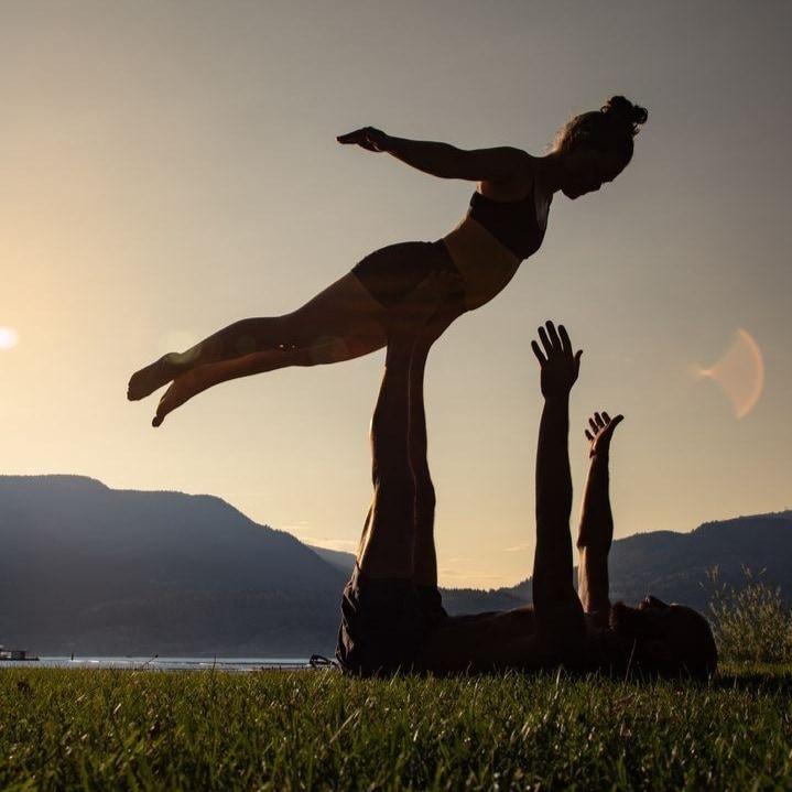 Silhouette acro at sunset