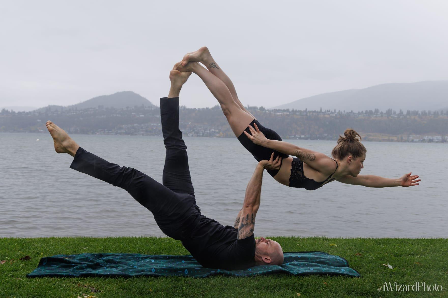 Lakefront acro on a grey day